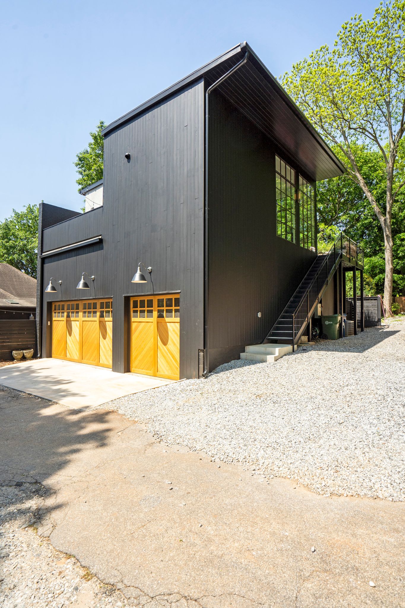 Modern black exterior architectural home available as a film rental property